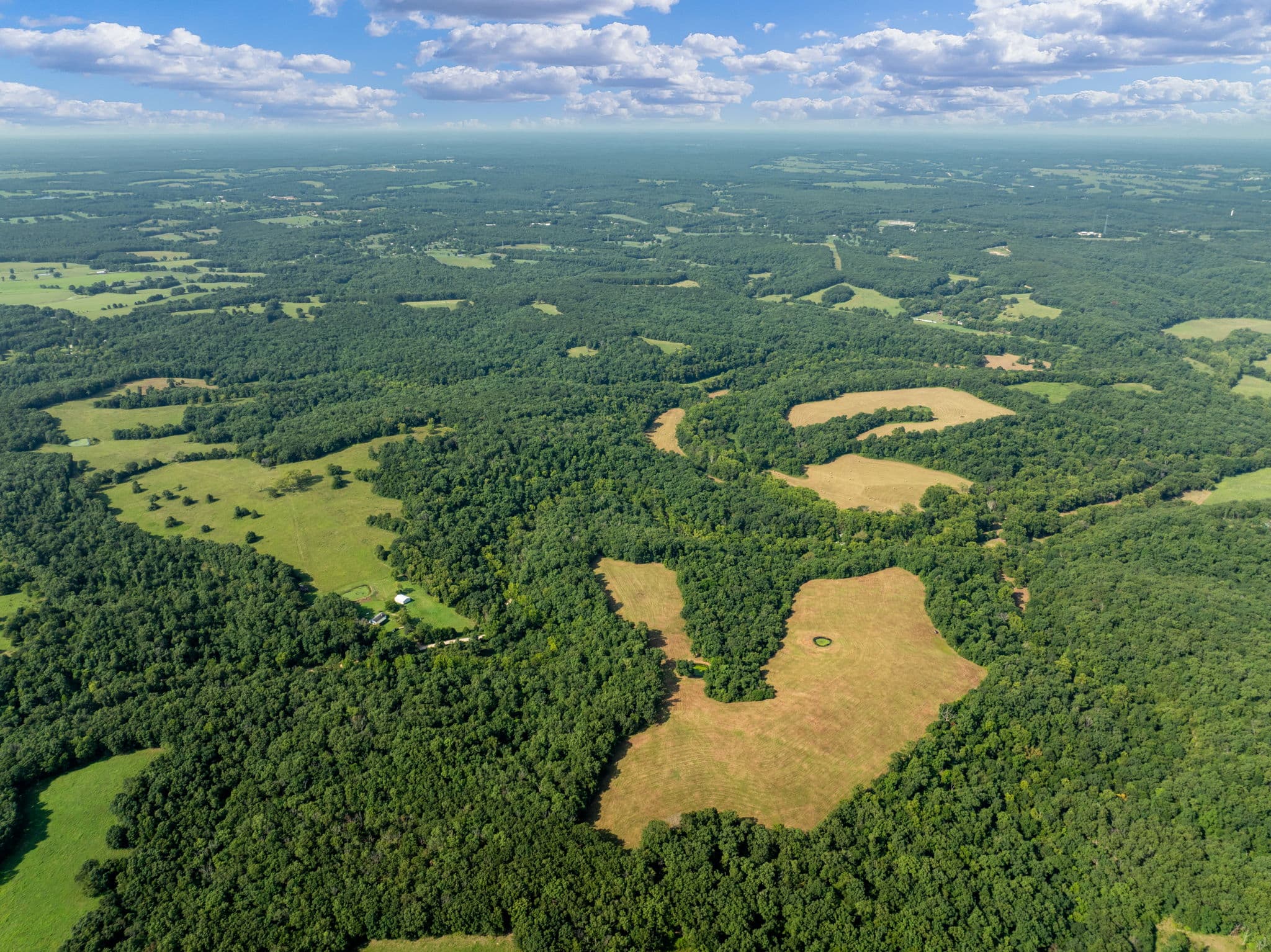 Aerial overview of the pastures and hay ground