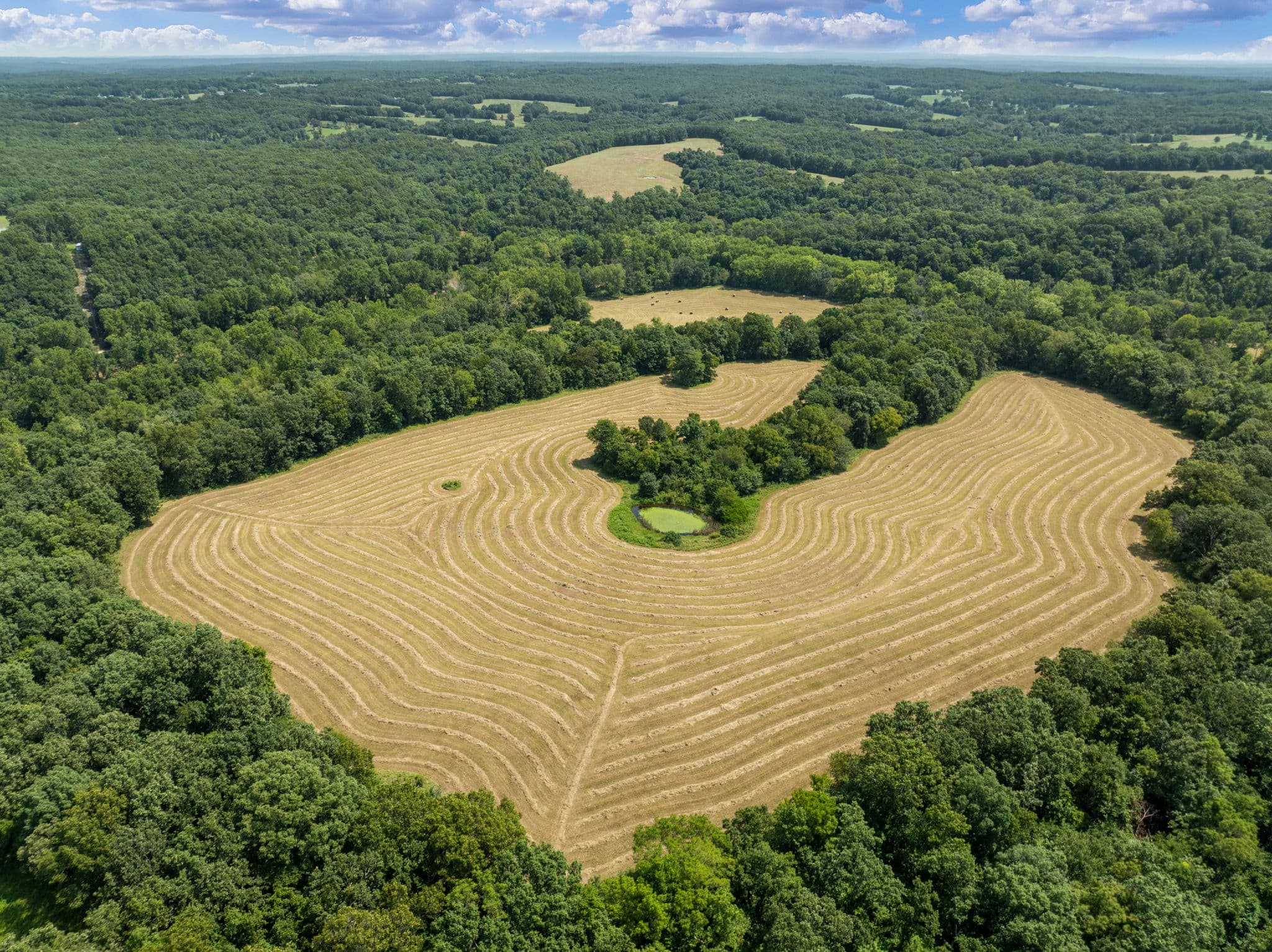 Aerial of freshly mowed hay ground