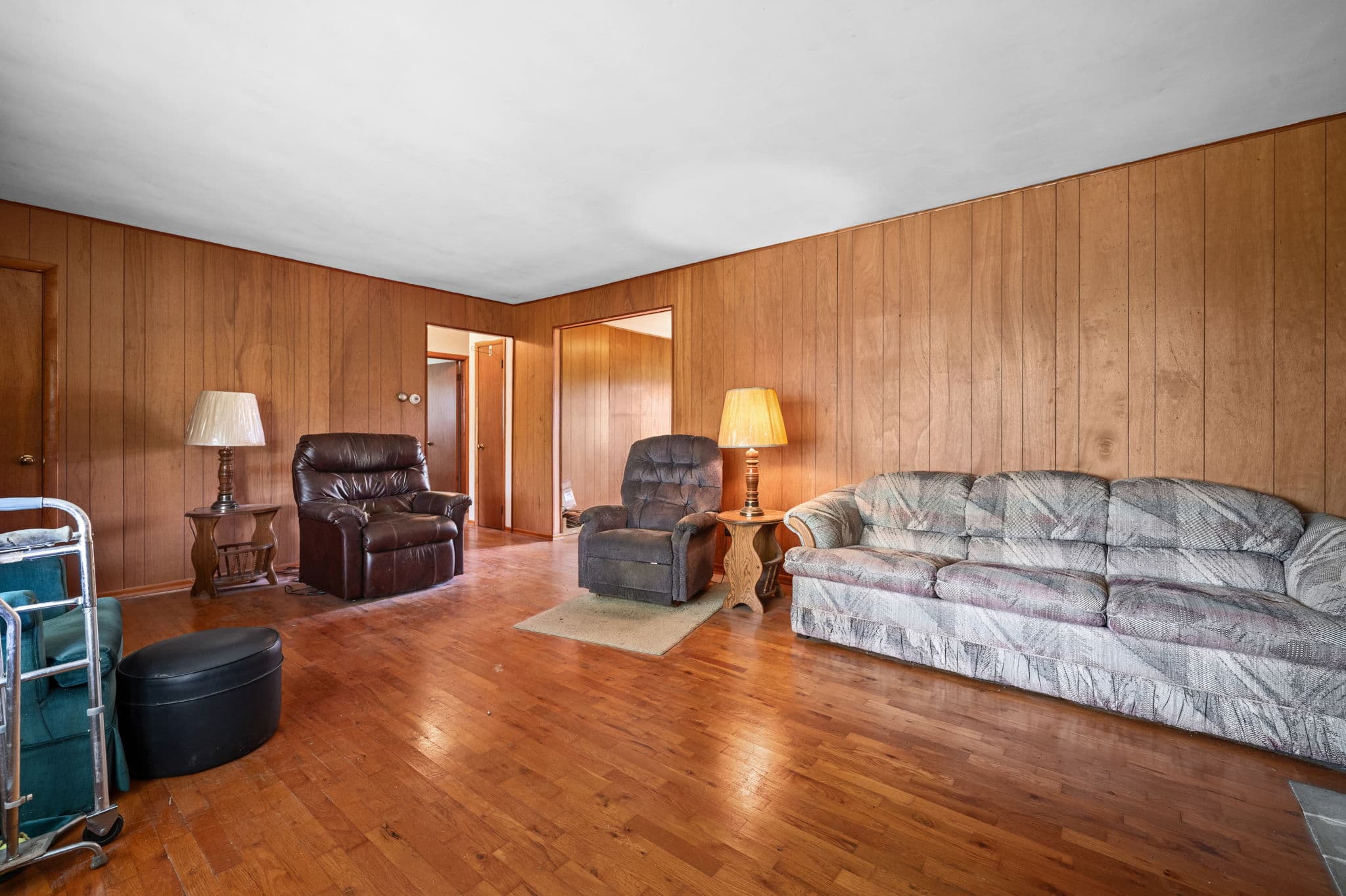 Paneled living room in the ranch house