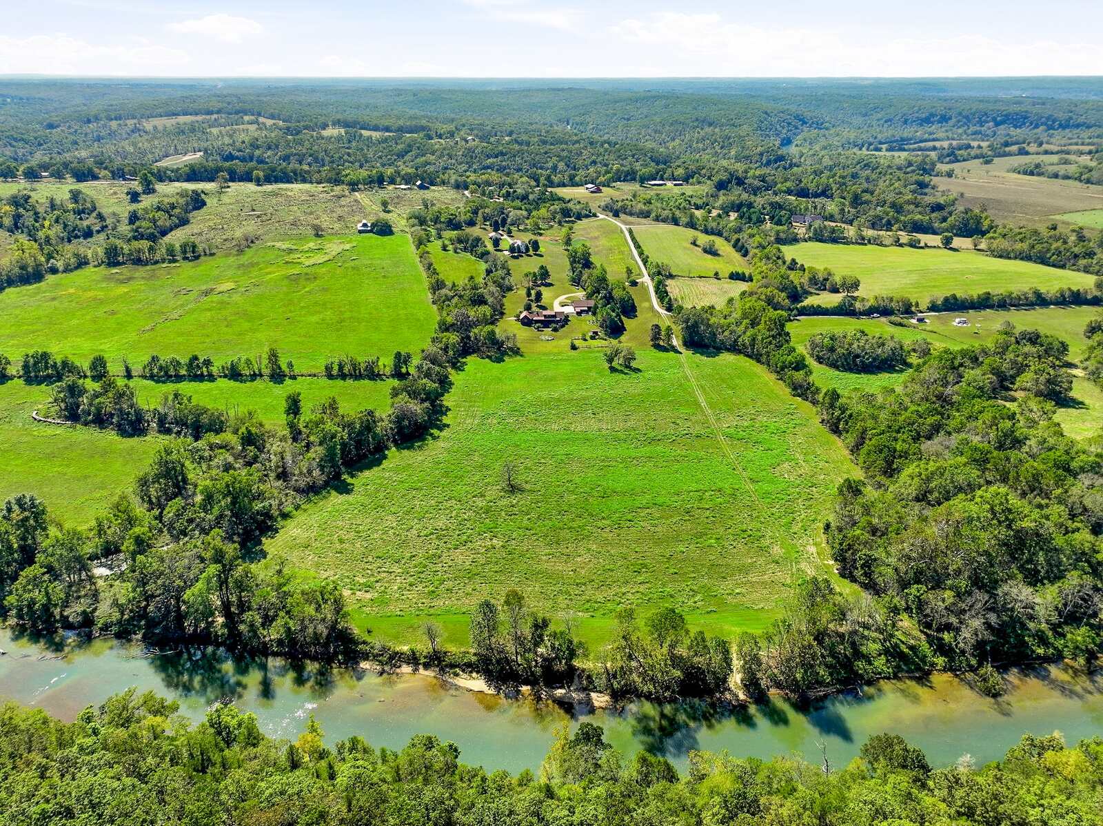 Aerial of the river valley and pasture surrounding Meramec Trails