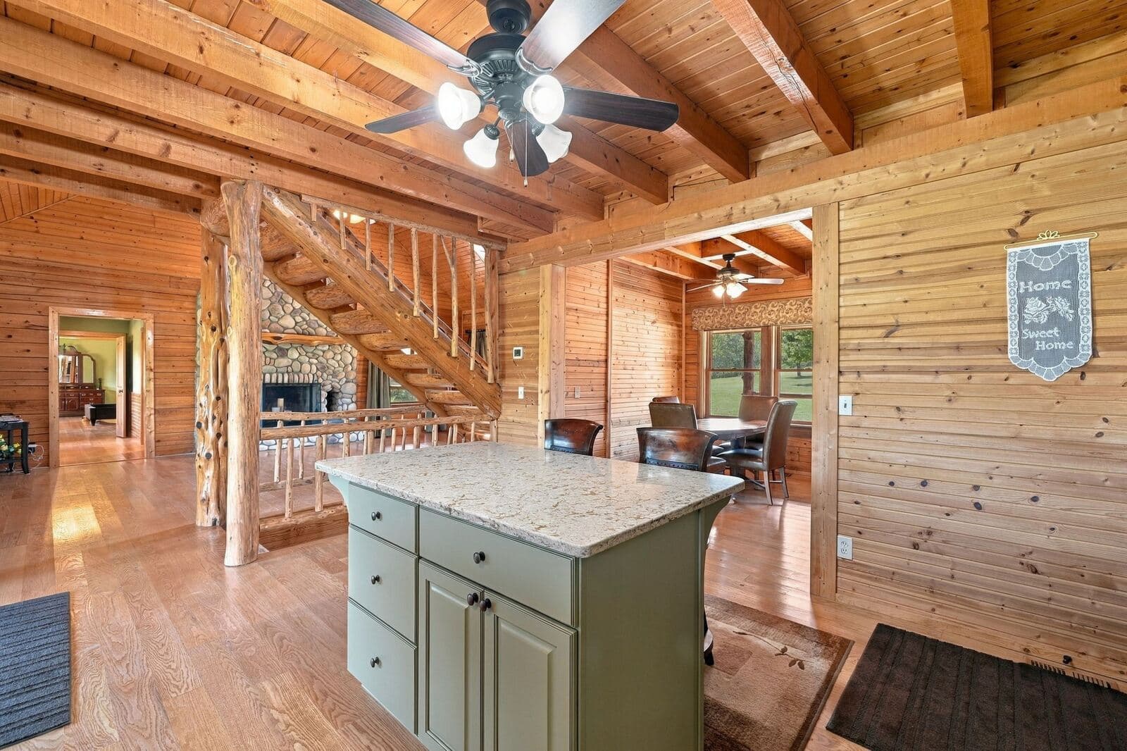Kitchen island and open log interior