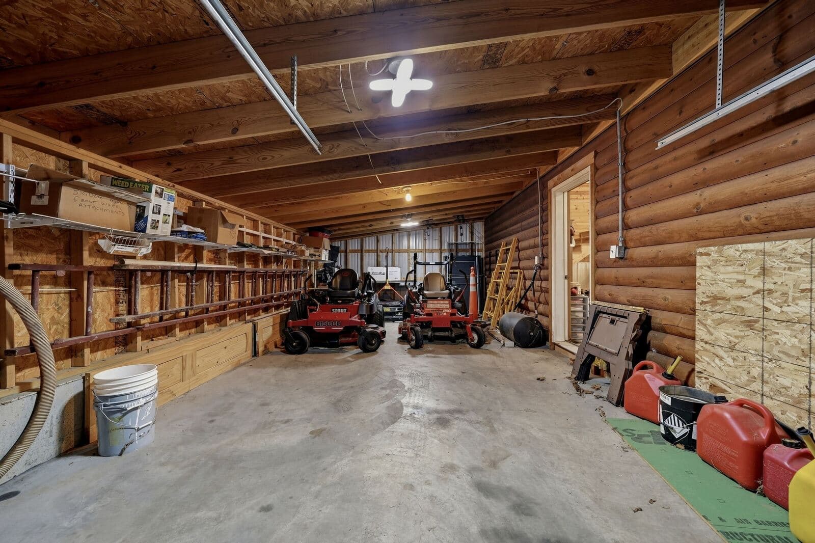 Covered equipment bay in the barn