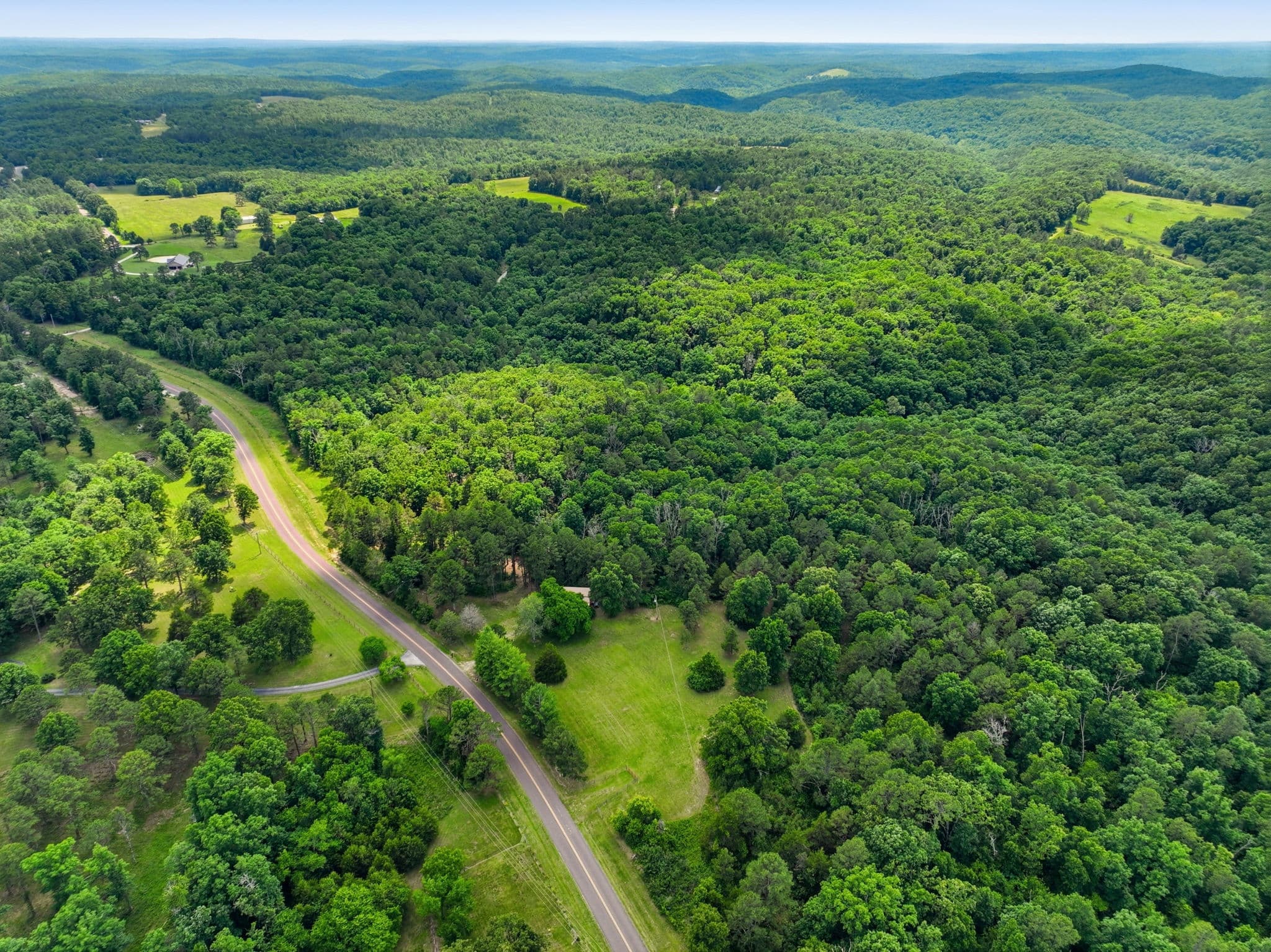 Aerial view over the surrounding Ozark hills