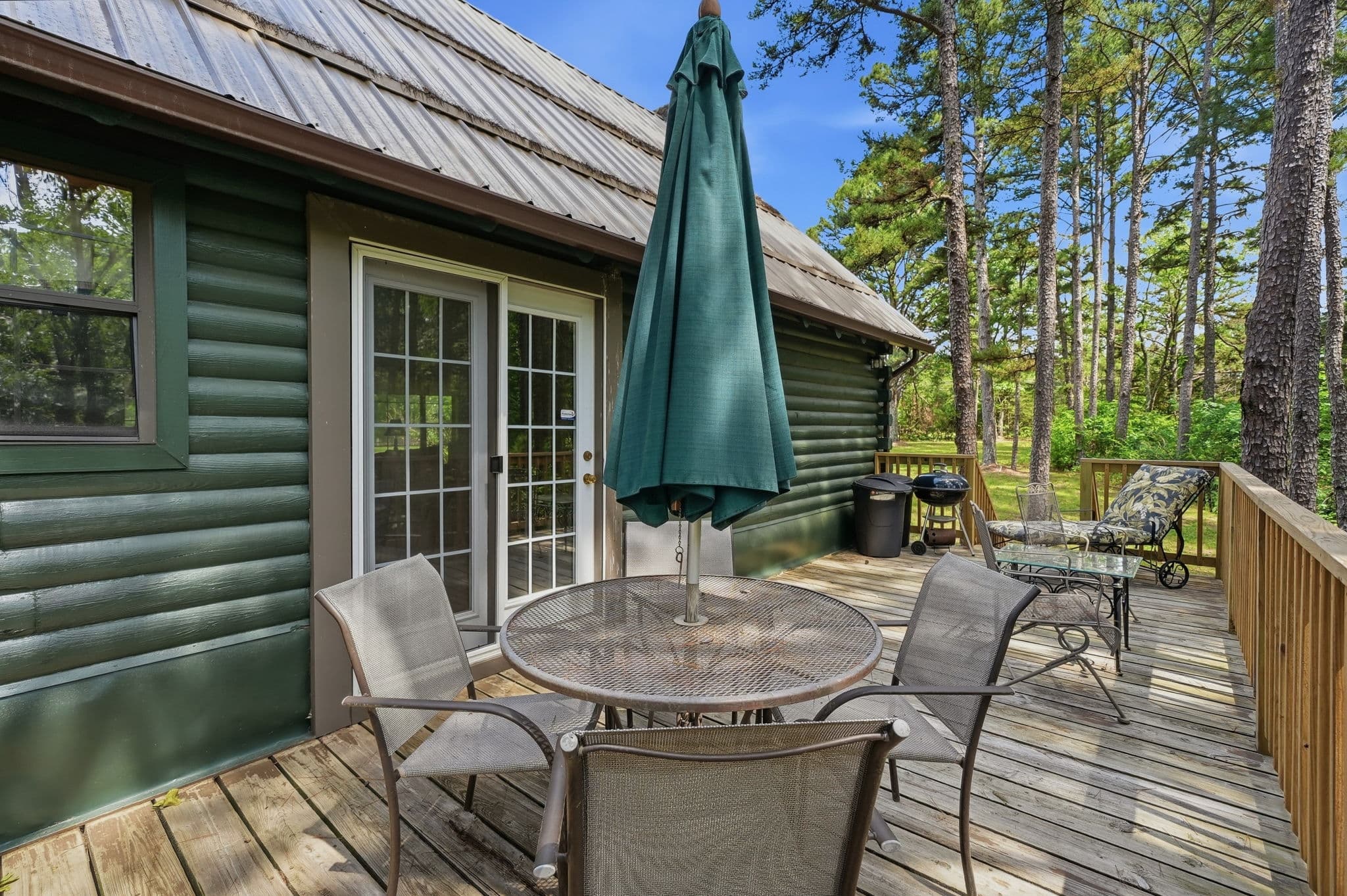 Outdoor dining area off the cabin doors